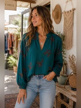 Vintage Rhapsody V-neck, long sleeve floral teal blouse.